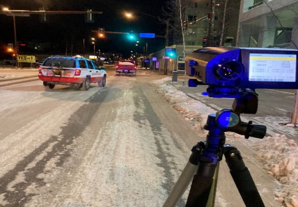 Field measurement of an illuminated LED traffic signal using a spectroradiometer in Alaska.